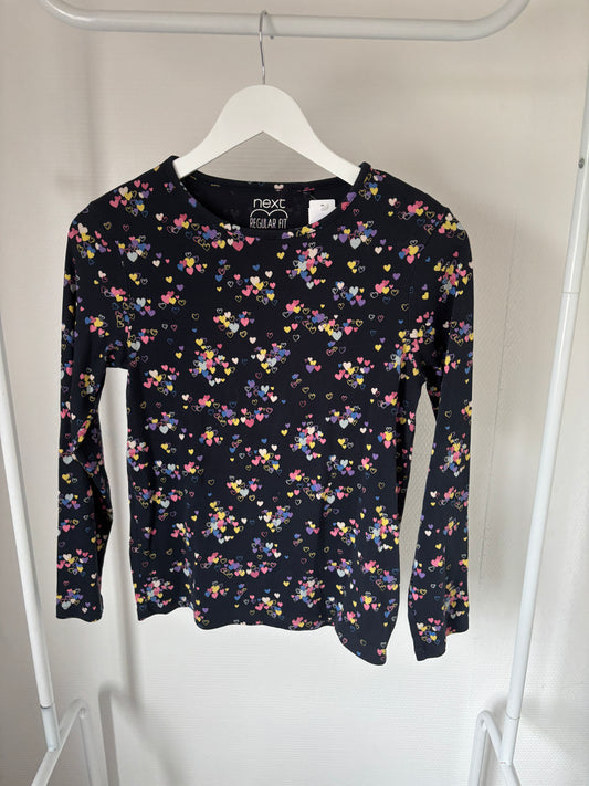 Marineblauwe riblongsleeve met bloemetjes