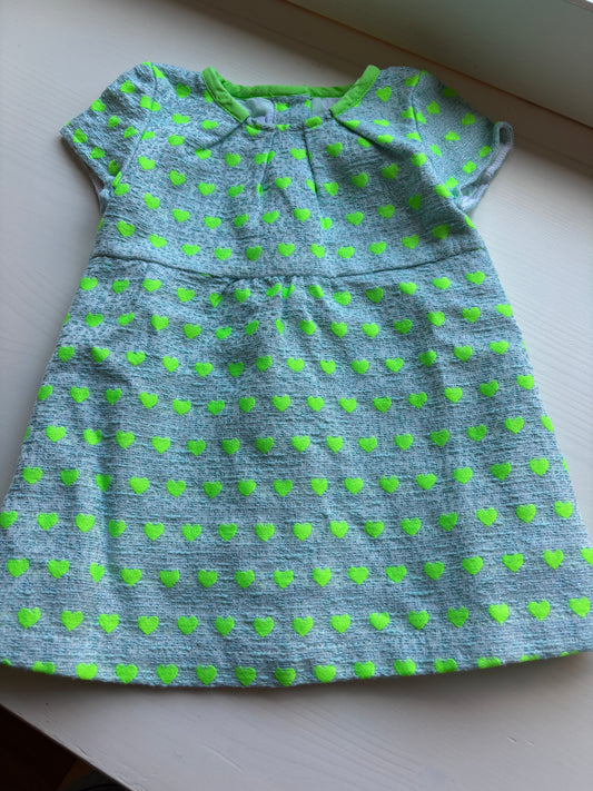 Lichtblauw jurkje met groene hartjes