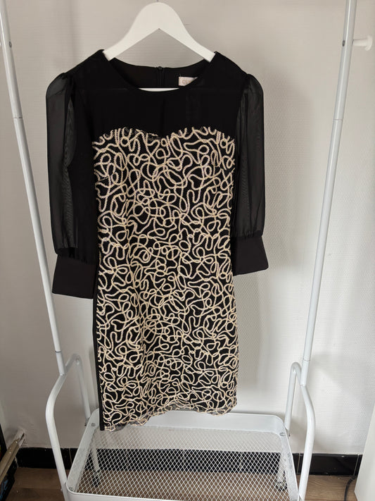 Zwarte jurk met gouden accentjes