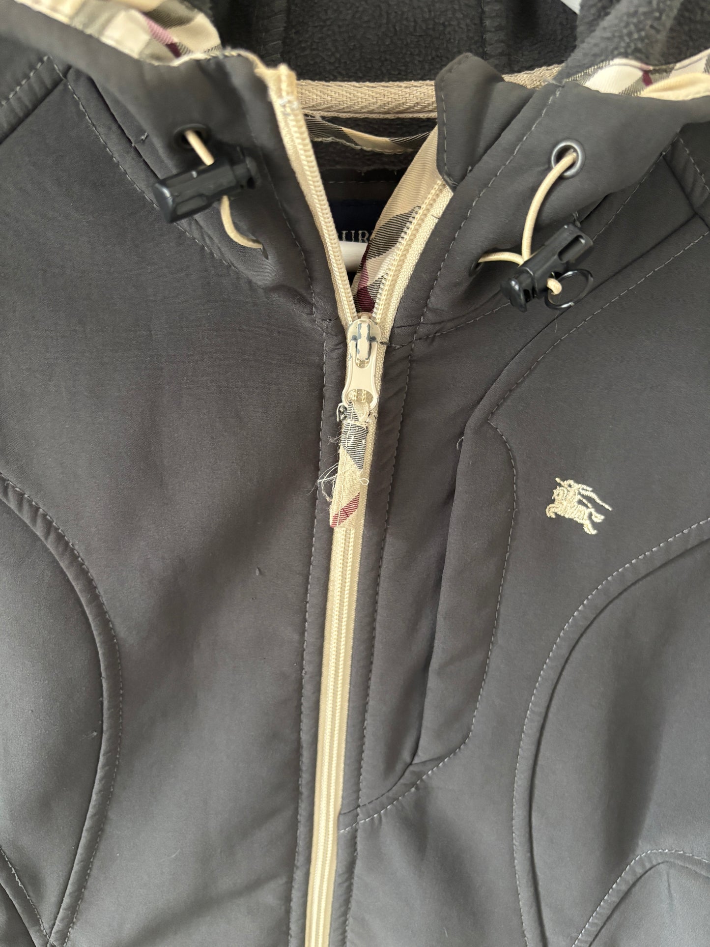 Grijze winddichte jas