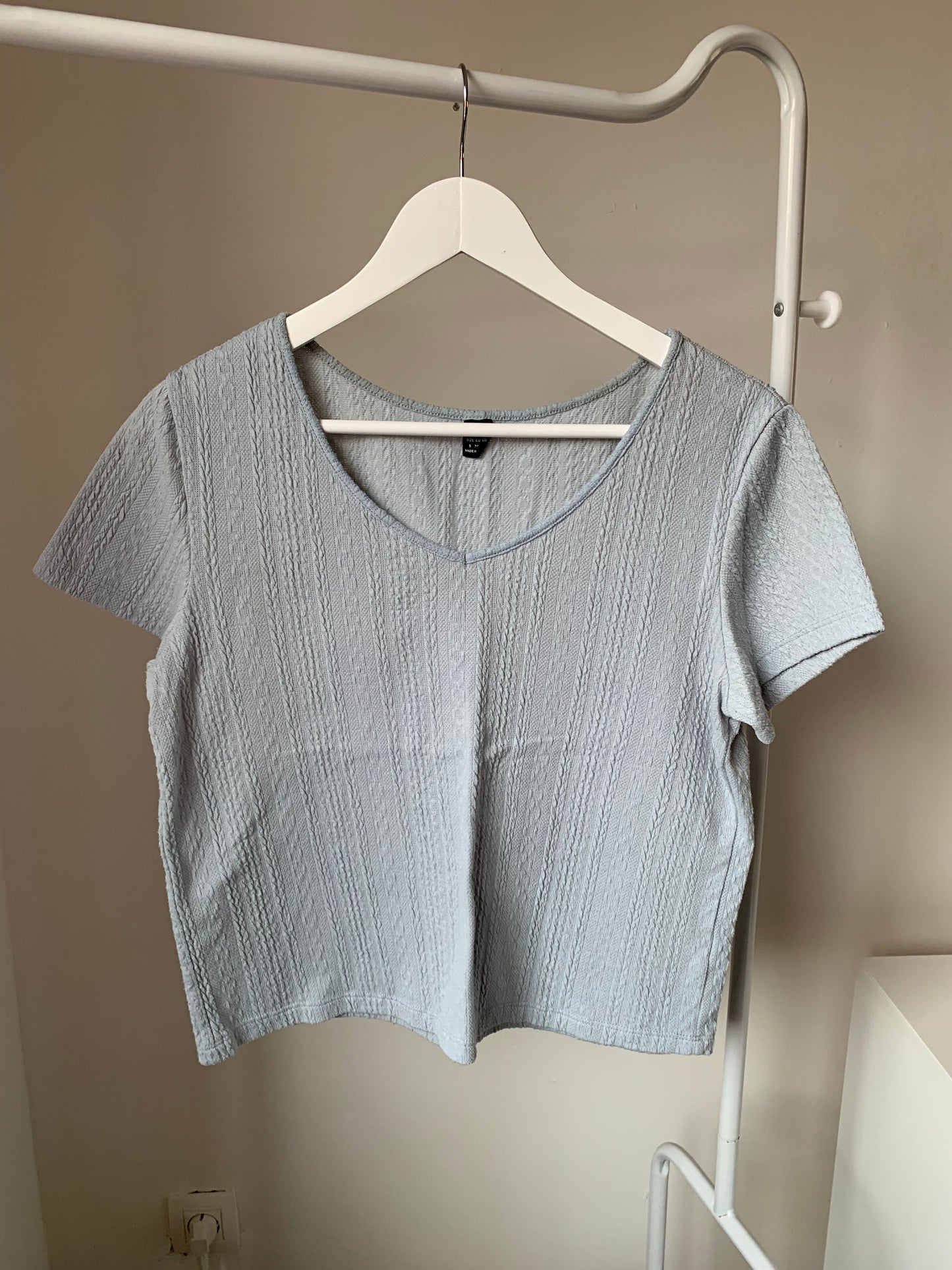 Lichtblauwe T-shirt