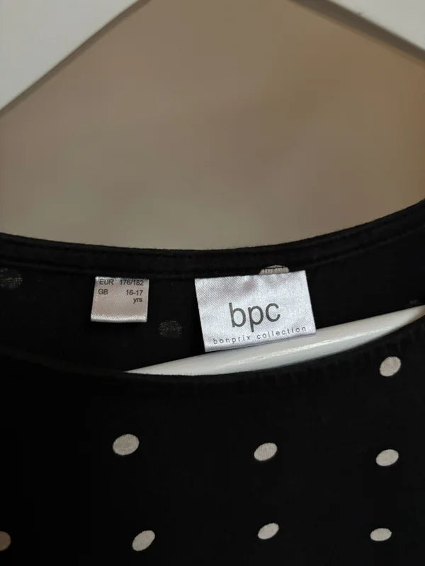 Zwarte gestippelde jurk met lange mouwen