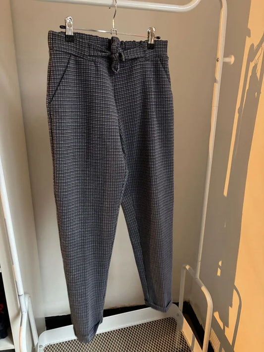 Grijze geruite broek