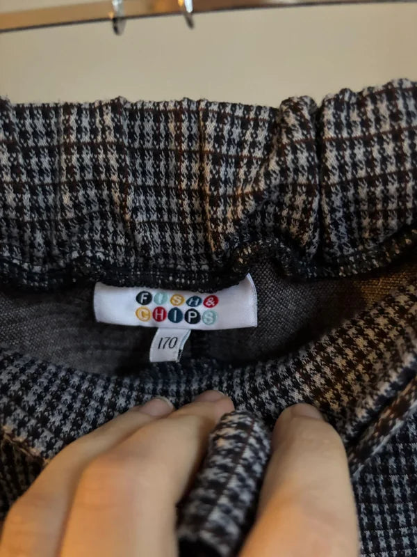 Grijze geruite broek