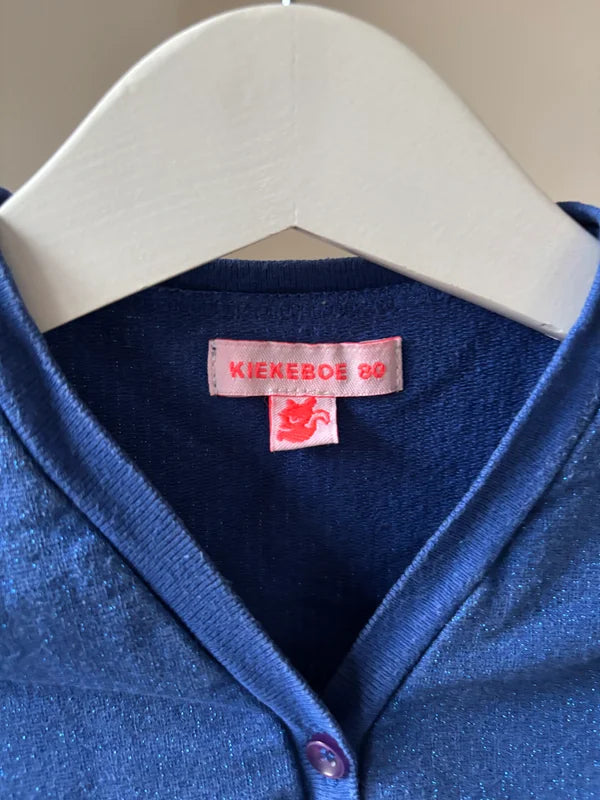 Blauwe glittercardigan