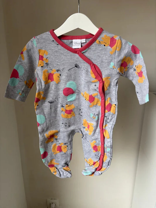 Grijze eendelige pyjama Winnie The Pooh