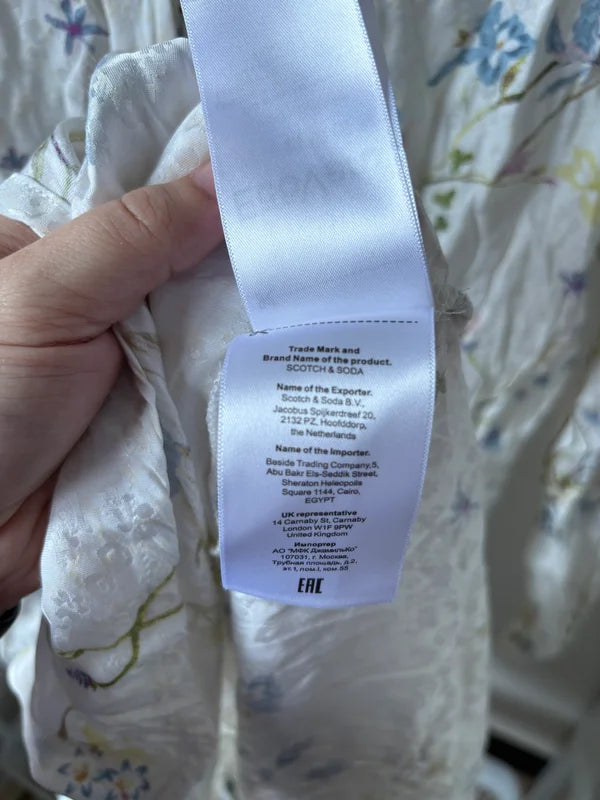 Witte lange bloemenjurk