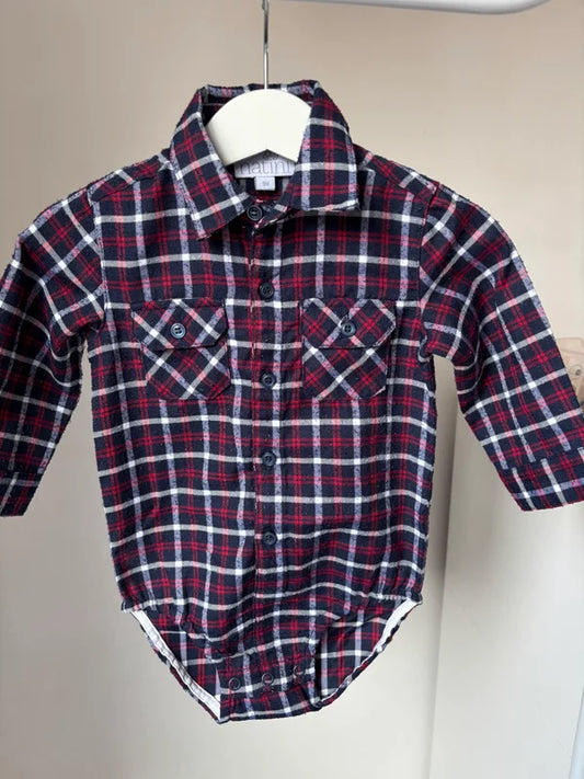 Geruite romper met lange mouwen