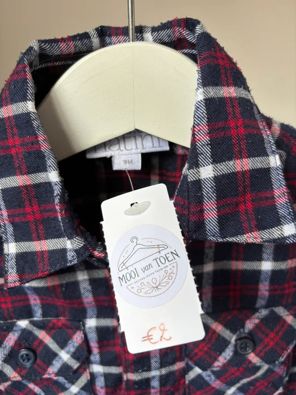 Geruite romper met lange mouwen