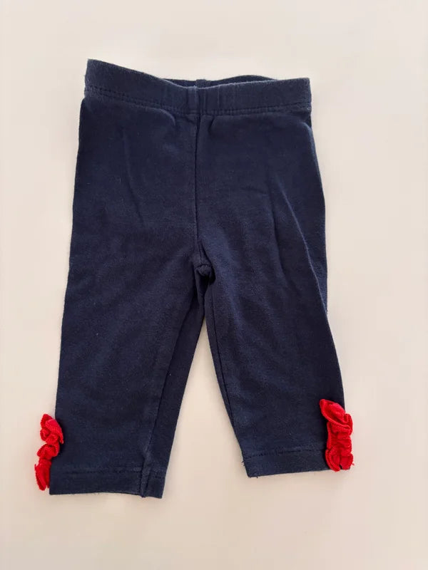 Marineblauwe legging met rode strikjes