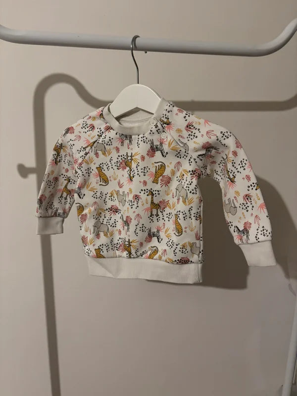 Witte sweater met diertjes