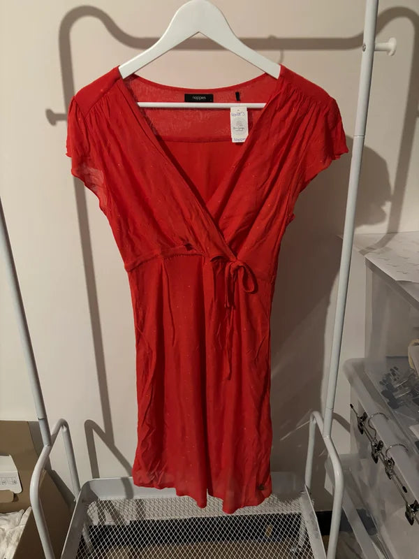 Rode zwangerschapsjurk met glitters