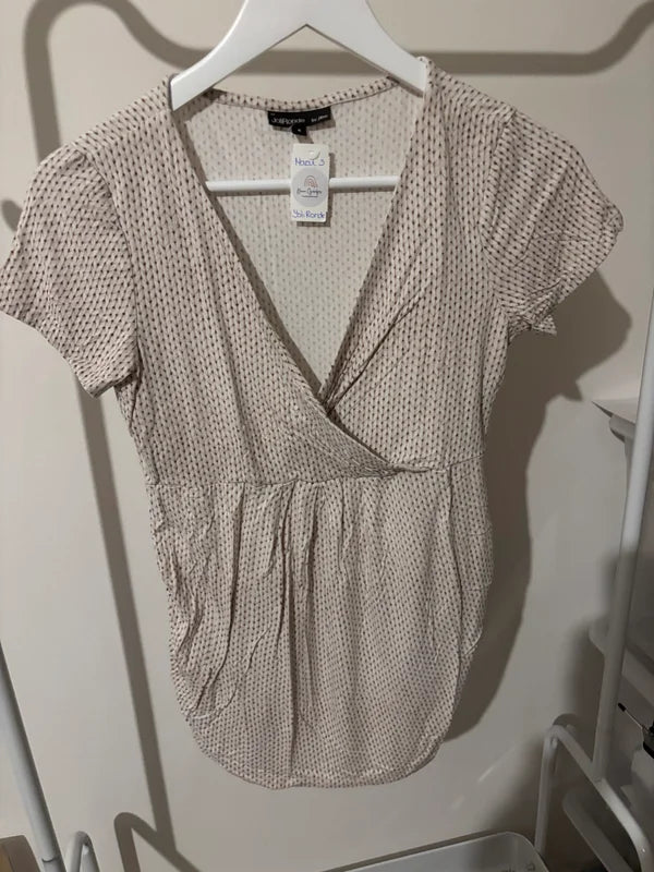 Witte gestippelde zwangerschapsblouse