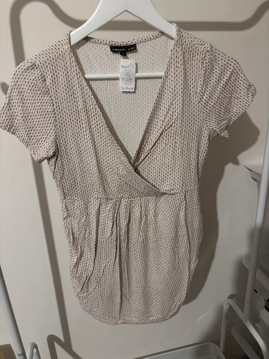 Witte gestippelde zwangerschapsblouse