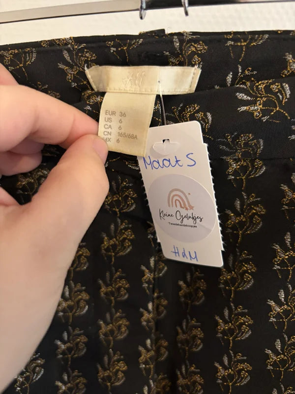 Zwarte broek met gouden print