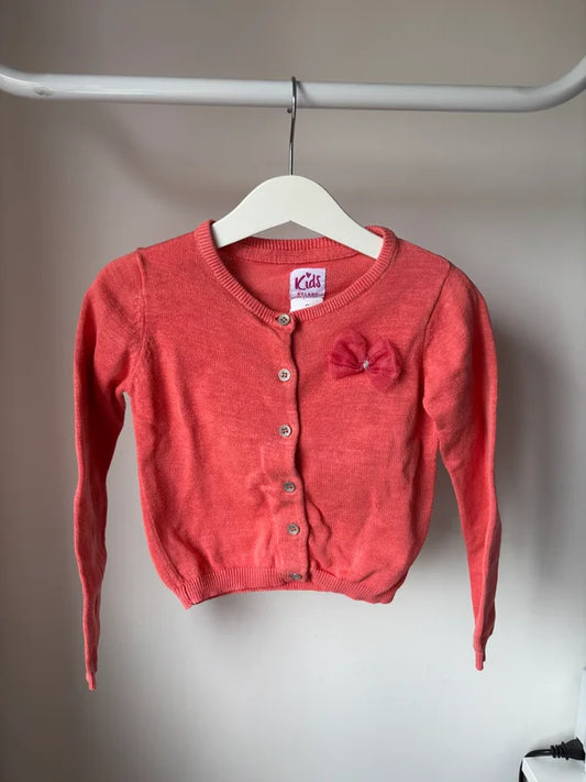 Koraalkleurige cardigan