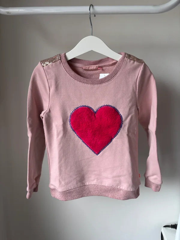 Lichtroze sweater met hartje