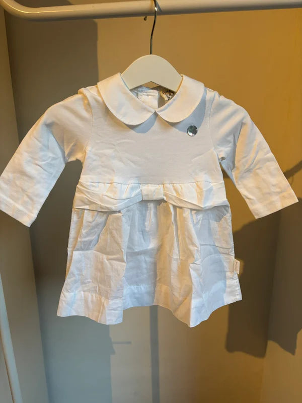 Wit jurkje met lange mouwen